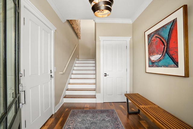 1182 Milia St, Kalaheo, HI 96741 - foyer entrance with crown molding, dark wood-type flooring, stairway, and baseboards