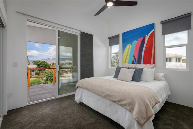 68-1868 Malina Pl, Waikoloa, HI 96738 - bedroom featuring access to exterior, dark colored carpet, and ceiling fan