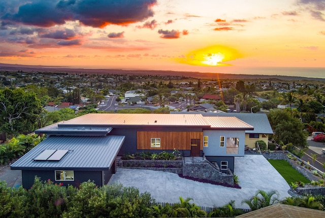 68-1868 Malina Pl, Waikoloa, HI 96738 - view of front of house featuring metal roof, a patio, and a standing seam roof