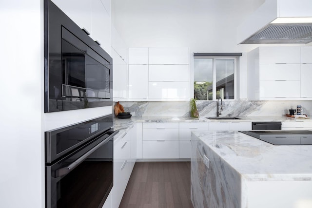 68-1868 Malina Pl, Waikoloa, HI 96738 - kitchen with modern cabinets, black appliances, custom range hood, and a sink