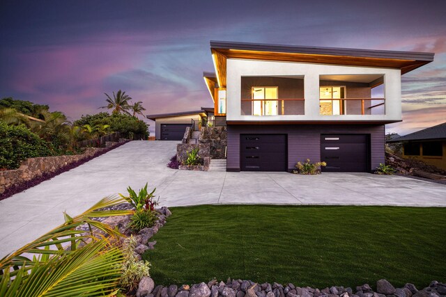 68-1868 Malina Pl, Waikoloa, HI 96738 - modern home with a balcony, concrete driveway, a front yard, and an attached garage