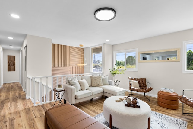 1577 Maunakai St, Hilo, HI 96720 - living room featuring healthy amount of natural light, wood finished floors, baseboards, and recessed lighting