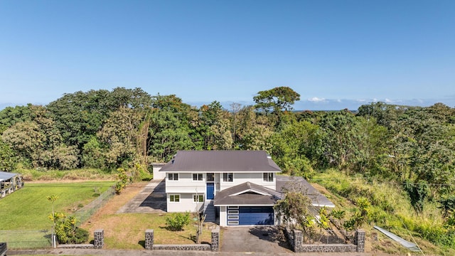 1577 Maunakai St, Hilo, HI 96720 - view of subject property with a heavily wooded area