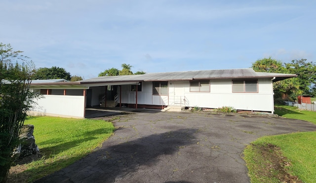 90 Palua Loop, Hilo, HI 96720 - single story home with an attached carport, a front lawn, and asphalt driveway