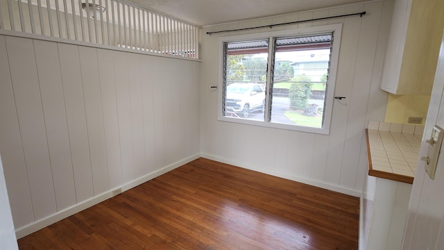 90 Palua Loop, Hilo, HI 96720 - unfurnished dining area featuring wood finished floors and baseboards