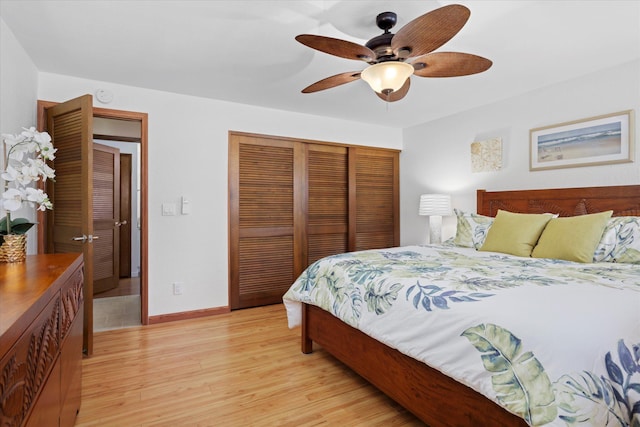 78-6842 Alii Dr Unit 11102, Kailua-Kona, HI 96740 - bedroom featuring a closet, light wood-type flooring, baseboards, and a ceiling fan