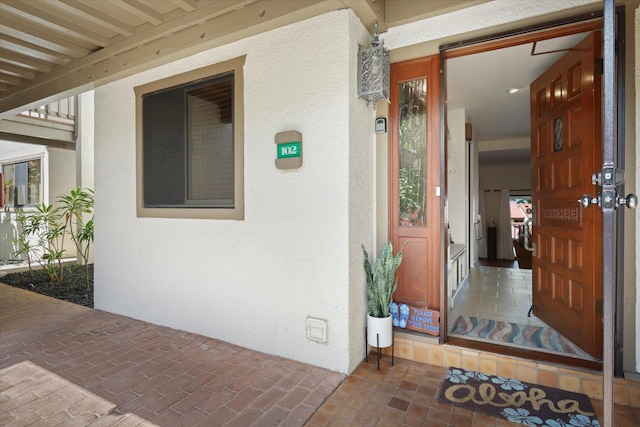 78-6842 Alii Dr Unit 11102, Kailua-Kona, HI 96740 - entrance to property featuring stucco siding