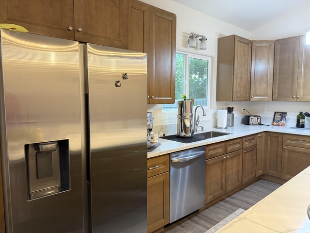 16-1844 34th Ave, Keaau, HI 96749 - kitchen with stainless steel appliances, a sink, and wood finished floors