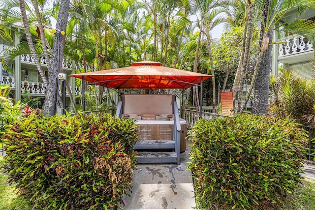 75-5776 Kuakini Hwy Unit 335, Kailua-Kona, HI 96740 - wooden terrace featuring a hot tub and a gazebo