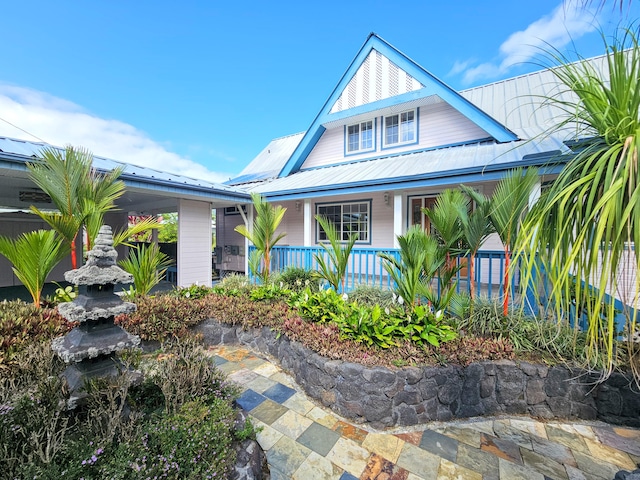 726-A Waianuenue Ave, Hilo, HI 96720 - view of front facade with a porch and metal roof