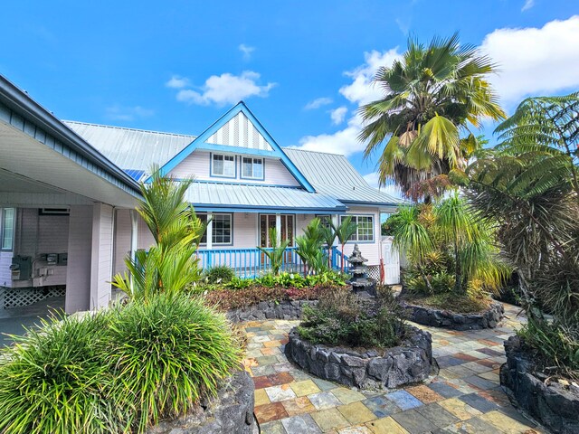 726-A Waianuenue Ave, Hilo, HI 96720 - view of front of home with a porch and metal roof