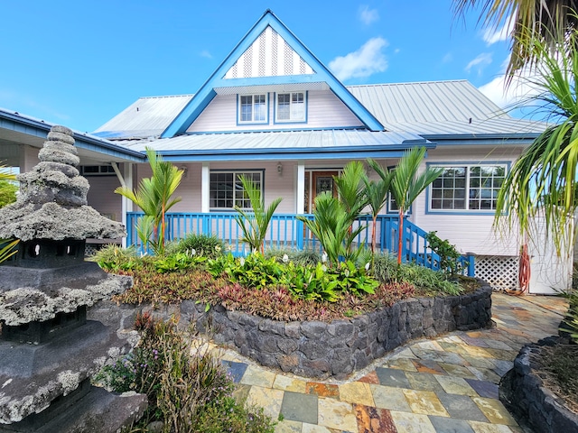 726-A Waianuenue Ave, Hilo, HI 96720 - view of front of house with a porch and metal roof