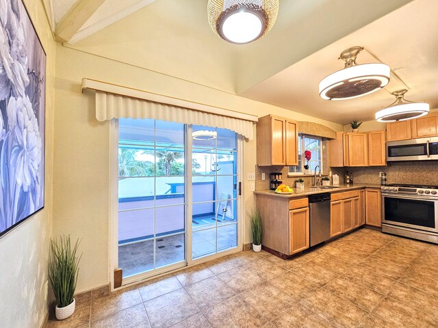 726-A Waianuenue Ave, Hilo, HI 96720 - kitchen with stainless steel appliances, a sink, decorative backsplash, baseboards, and light countertops