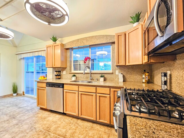 726-A Waianuenue Ave, Hilo, HI 96720 - kitchen featuring appliances with stainless steel finishes, a sink, decorative backsplash, light countertops, and light tile patterned floors