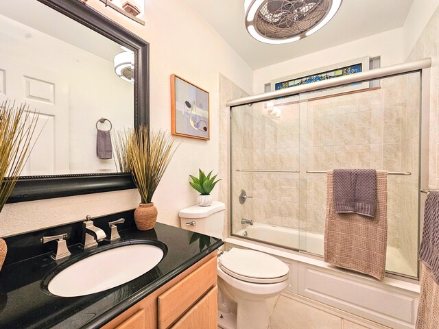 726-A Waianuenue Ave, Hilo, HI 96720 - bathroom featuring toilet, vanity, enclosed tub / shower combo, and tile patterned floors