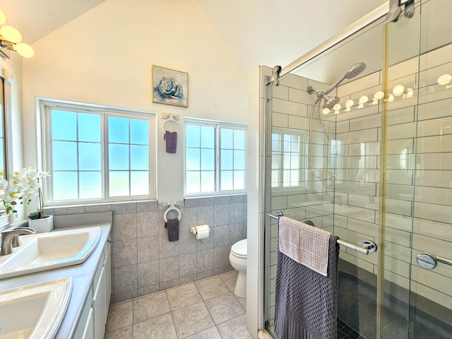 726-A Waianuenue Ave, Hilo, HI 96720 - full bath featuring vaulted ceiling, tile walls, vanity, tile patterned flooring, and a stall shower