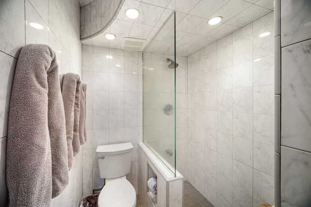 1677 Pee Rd Unit B2, Koloa, HI 96756 - bathroom with tile walls, a walk in shower, toilet, and recessed lighting
