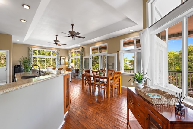 15-1932 2nd Ave, Keaau, HI 96749 - dining area with a raised ceiling, dark wood-style floors, recessed lighting, ceiling fan, and baseboards