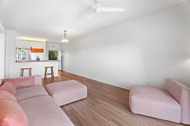 73-1101 Nuuanu Pl Unit D204, Kailua-Kona, HI 96740 - living area featuring wood finished floors and ceiling fan