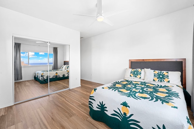 73-1101 Nuuanu Pl Unit D204, Kailua-Kona, HI 96740 - bedroom with wood finished floors and ceiling fan