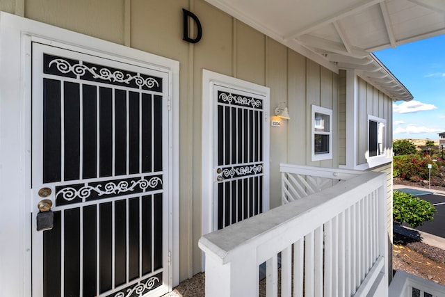 73-1101 Nuuanu Pl Unit D204, Kailua-Kona, HI 96740 - doorway to property featuring board and batten siding and covered porch