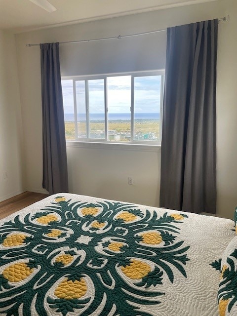 73-1101 Nuuanu Pl Unit D204, Kailua-Kona, HI 96740 - bedroom with wood finished floors
