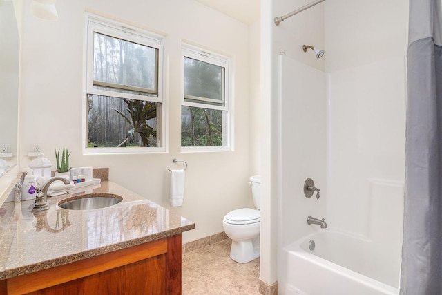46-3910 Kahana Dr, Honokaa, HI 96727 - full bath with vanity, toilet, shower / bath combination, baseboards, and tile patterned flooring