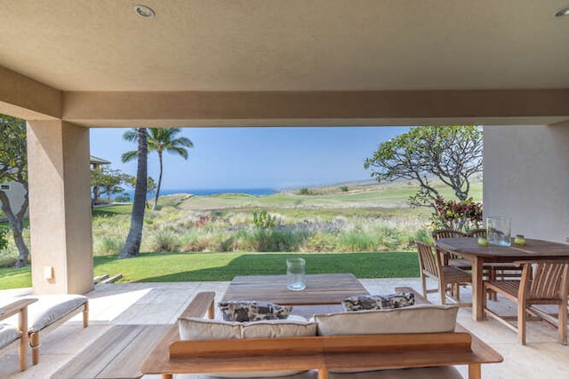 62-3600 Amaui Pl Unit J101, Kamuela, HI 96743 - view of patio / terrace featuring an outdoor living space with a fire pit and outdoor dining area