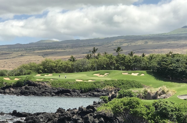62-3600 Amaui Pl Unit J101, Kamuela, HI 96743 - view of property's community featuring a water and mountain view, golf course view, and a lawn