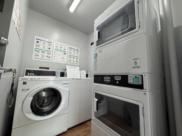 400 Hualani St Unit 2207, Hilo, HI 96720 - shared laundry with washing machine and clothes dryer, stacked washing machine and dryer, and wood finished floors