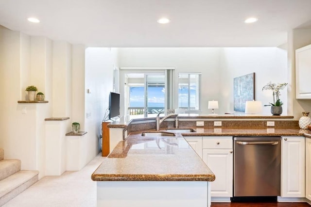 75-6060 Kuakini Hwy Unit D23, Kailua-Kona, HI 96740 - kitchen with stainless steel dishwasher, a sink, white cabinetry, recessed lighting, and dark stone countertops