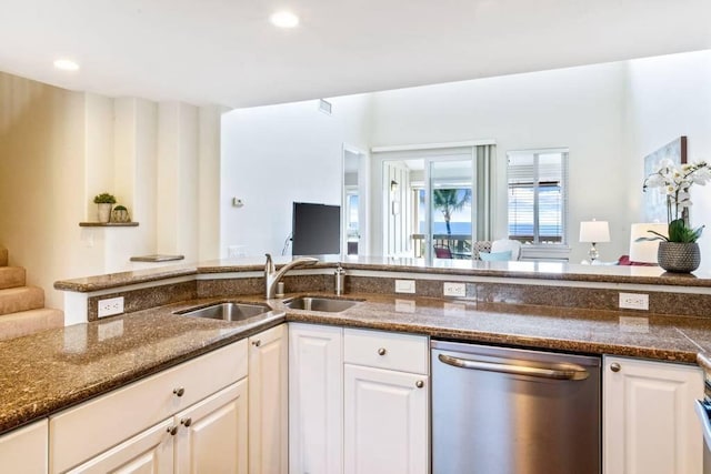 75-6060 Kuakini Hwy Unit D23, Kailua-Kona, HI 96740 - kitchen featuring stainless steel dishwasher, a sink, white cabinetry, dark stone countertops, and recessed lighting