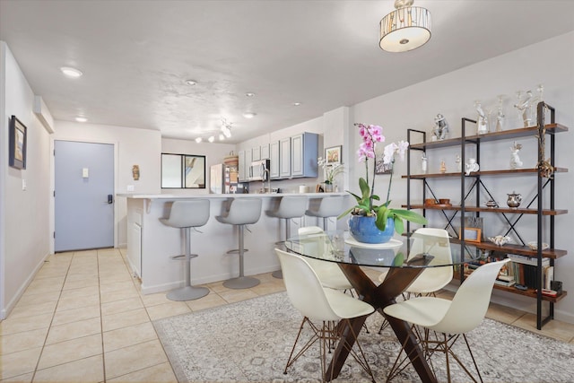 77-6585 Seaview Cir Unit 303, Kailua-Kona, HI 96740 - dining room with light tile patterned floors, baseboards, and recessed lighting