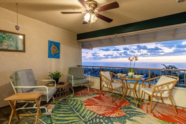 77-6585 Seaview Cir Unit 303, Kailua-Kona, HI 96740 - view of patio featuring a water view, ceiling fan, and a balcony