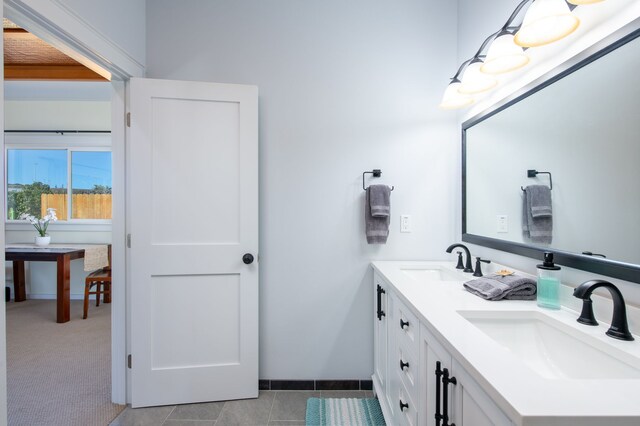 68-3635 Haena St, Waikoloa, HI 96738 - bathroom featuring double vanity and baseboards