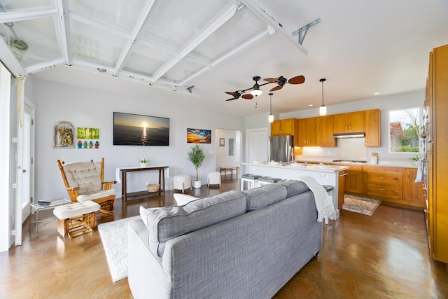 15-2000 5th Ave, Keaau, HI 96749 - living room with concrete floors and ceiling fan
