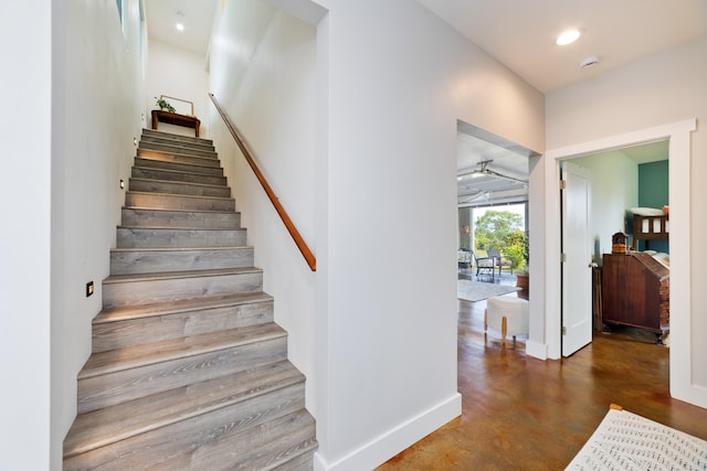 15-2000 5th Ave, Keaau, HI 96749 - stairs with baseboards, concrete floors, and recessed lighting