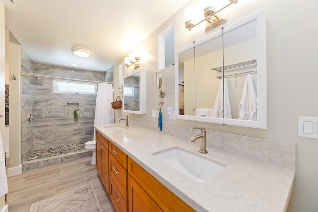 15-2000 5th Ave, Keaau, HI 96749 - full bathroom with a shower stall, double vanity, toilet, and wood finished floors