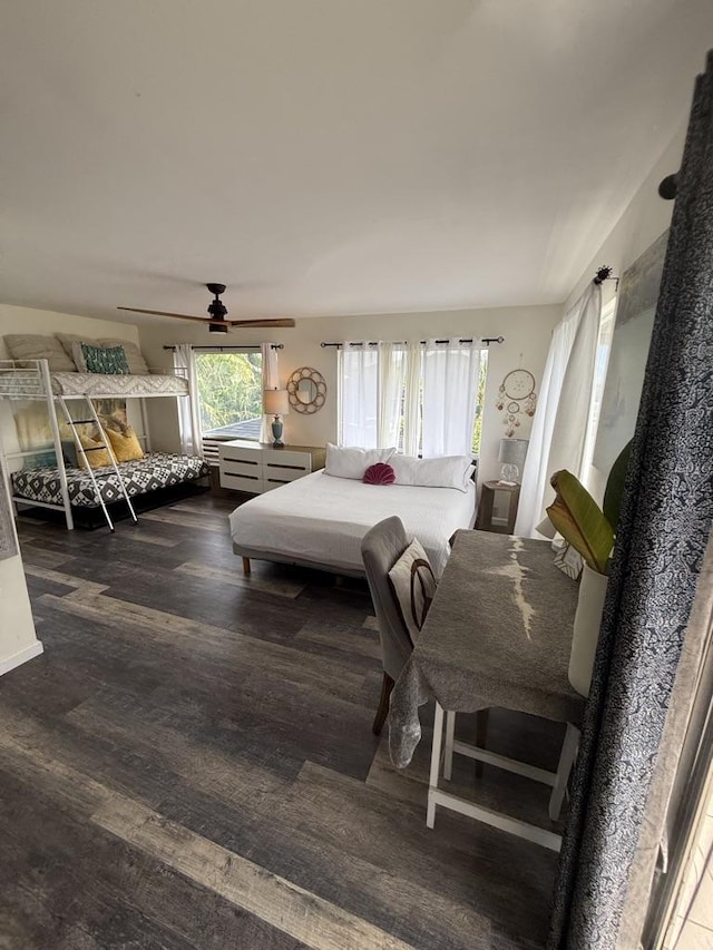 4194 Kekuanaoa Ln, Princeville, HI 96722 - bedroom with wood finished floors and ceiling fan