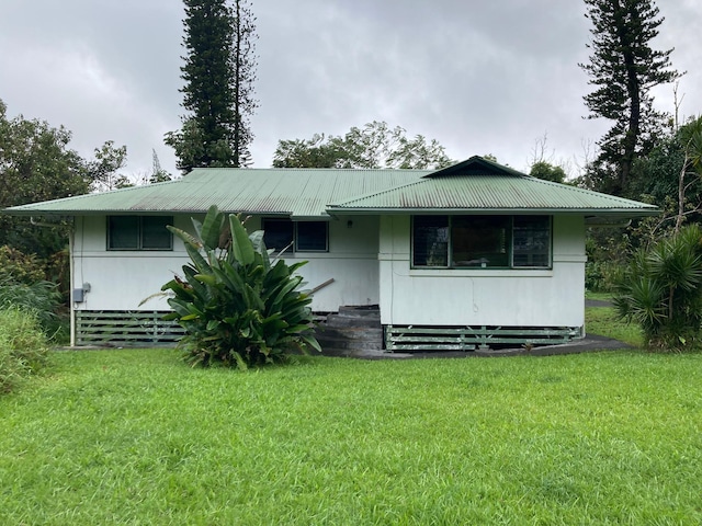 13-3515 Pahoa Kalapana Rd, Pahoa, HI 96778 - back of house with a lawn and metal roof