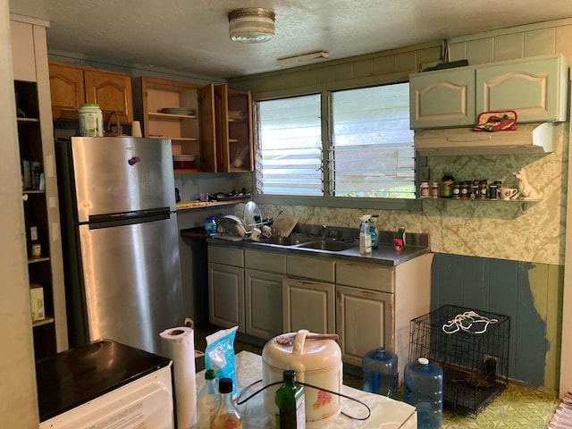 13-3515 Pahoa Kalapana Rd, Pahoa, HI 96778 - kitchen with freestanding refrigerator, a sink, open shelves, dark countertops, and a textured ceiling