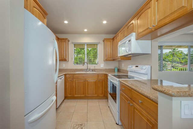 78-7054 Kamehameha Iii Rd Unit 803, Kailua-Kona, HI 96740 - kitchen with white appliances, a sink, recessed lighting, light stone counters, and light tile patterned floors
