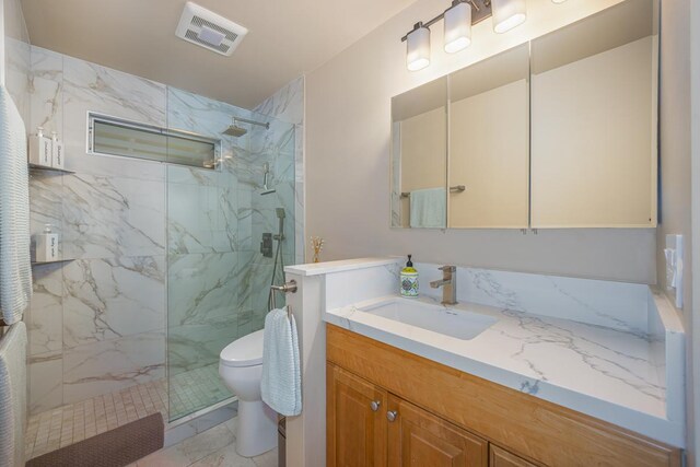 78-7054 Kamehameha Iii Rd Unit 803, Kailua-Kona, HI 96740 - full bathroom with marble look tiles, a marble finish shower, toilet, and vanity