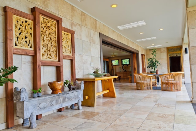 17-250 Meaulu St, Keaau, HI 96749 - lobby featuring tile walls, recessed lighting, and ornamental molding