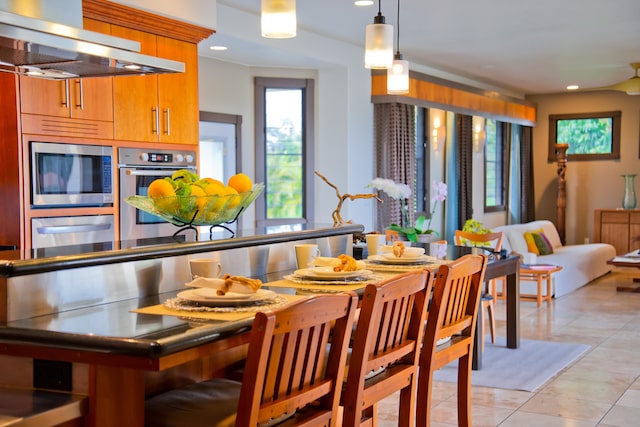 17-250 Meaulu St, Keaau, HI 96749 - dining room featuring light tile patterned floors and recessed lighting