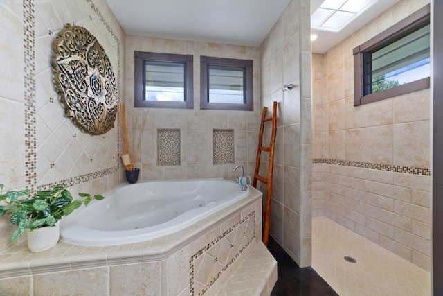 17-250 Meaulu St, Keaau, HI 96749 - full bath featuring a jetted tub, walk in shower, plenty of natural light, and tile walls