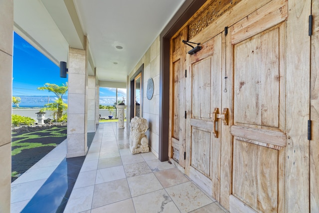 17-250 Meaulu St, Keaau, HI 96749 - view of patio / terrace featuring a water view