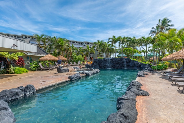 3811 Edward Rd Unit 8204, Princeville, HI 96722 - outdoor pool with a patio area