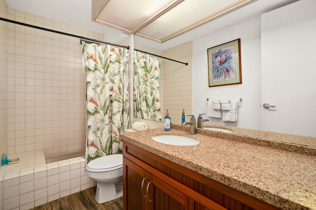 3811 Edward Rd Unit 8204, Princeville, HI 96722 - full bath featuring vanity, toilet, wood finished floors, and tiled shower
