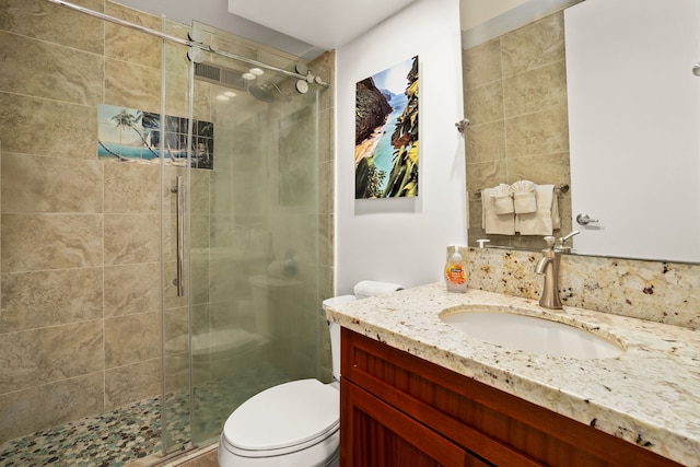 3811 Edward Rd Unit 8204, Princeville, HI 96722 - bathroom featuring vanity, a shower stall, and toilet